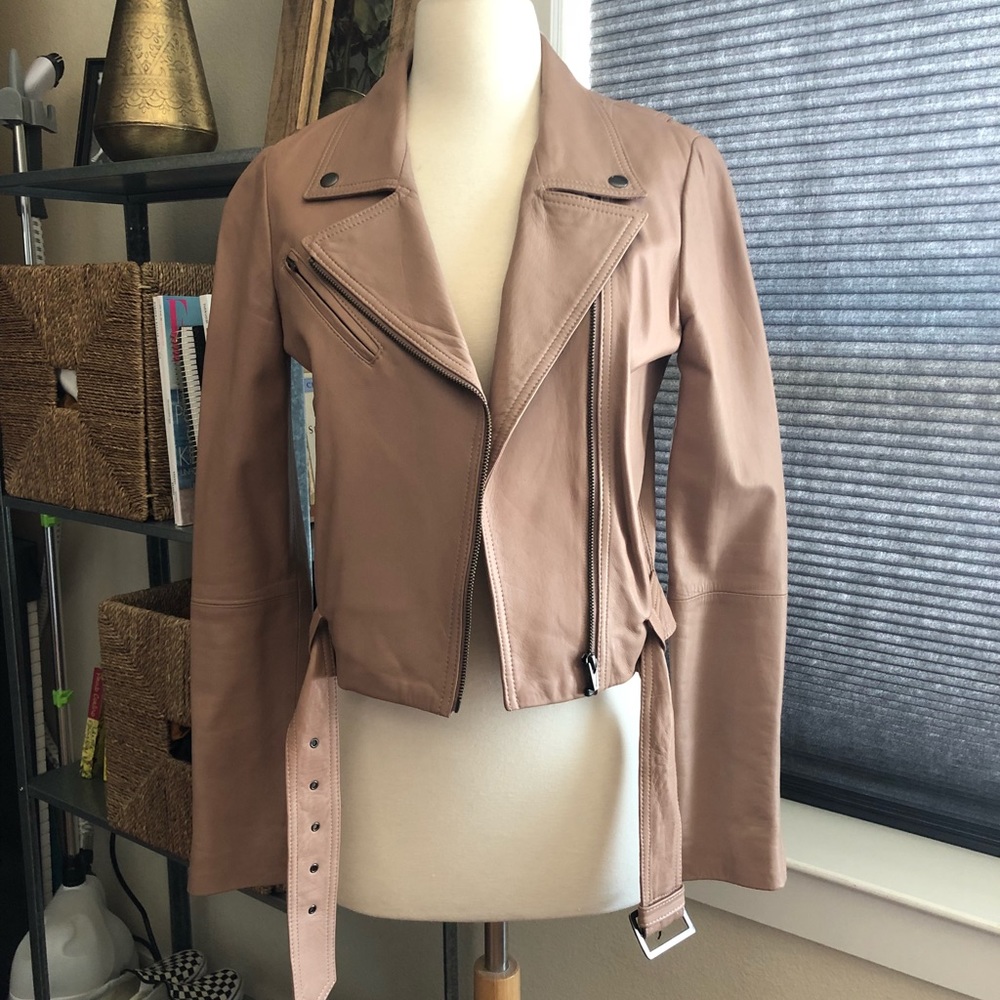 Genuine leather jacket. Barely worn. Like new!